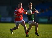 16 May 2025; Conor McCríosta of Louth in action against John McMonagle of Mayo during the Dalata Hotel Group GAA Football All-Ireland U20 Championship semi-final match between Mayo and Louth at Glennon Brothers Pearse Park in Longford. Photo by Stephen Marken/Sportsfile