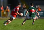 16 May 2025; Adam Gillespie of Louth in action against Paul Gilmore of Mayo during the Dalata Hotel Group GAA Football All-Ireland U20 Championship semi-final match between Mayo and Louth at Glennon Brothers Pearse Park in Longford. Photo by Stephen Marken/Sportsfile
