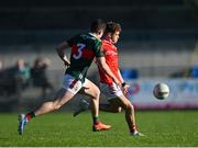 16 May 2025; Adam Gillespie of Louth in action against Paul Gilmore of Mayo during the Dalata Hotel Group GAA Football All-Ireland U20 Championship semi-final match between Mayo and Louth at Glennon Brothers Pearse Park in Longford. Photo by Stephen Marken/Sportsfile