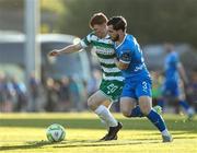 16 May 2025; Rory Gaffney of Shamrock Rovers in action against Ryan Burke of Waterford during the SSE Airtricity Men's Premier Division match between Waterford and Shamrock Rovers at the Regional Sports Centre in Waterford. Photo by Thomas Flinkow/Sportsfile
