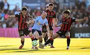 16 May 2025; Kerr McInroy of Shelbourne in action against Bohemians players Dawson Devoy, left, and Niall Morahan during the SSE Airtricity Men's Premier Division match between Bohemians and Shelbourne at Dalymount Park in Dublin. Photo by Seb Daly/Sportsfile