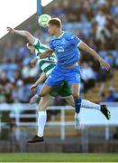 16 May 2025; Rory Gaffney of Shamrock Rovers in action against Kacper Radkowski of Waterford during the SSE Airtricity Men's Premier Division match between Waterford and Shamrock Rovers at the Regional Sports Centre in Waterford. Photo by Thomas Flinkow/Sportsfile