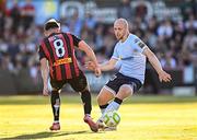 16 May 2025; Kerr McInroy of Shelbourne in action against Dayle Rooney of Bohemians during the SSE Airtricity Men's Premier Division match between Bohemians and Shelbourne at Dalymount Park in Dublin. Photo by Seb Daly/Sportsfile