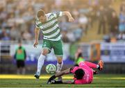 16 May 2025; Aaron Greene of Shamrock Rovers has an opportunity on goal denied by Waterford goalkeeper Stephen McMullan during the SSE Airtricity Men's Premier Division match between Waterford and Shamrock Rovers at the Regional Sports Centre in Waterford. Photo by Thomas Flinkow/Sportsfile