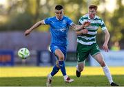 16 May 2025; Rory Gaffney of Shamrock Rovers in action against Darragh Leahy of Waterford during the SSE Airtricity Men's Premier Division match between Waterford and Shamrock Rovers at the Regional Sports Centre in Waterford. Photo by Thomas Flinkow/Sportsfile