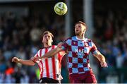 16 May 2025; Conor Keeley of Drogheda United in action against Gavin Whyte of Derry City during the SSE Airtricity Men's Premier Division match between Drogheda United and Derry City at Sullivan & Lambe Park in Drogheda, Louth. Photo by Ramsey Cardy/Sportsfile