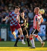 16 May 2025; Warren Davis of Drogheda United in action against Liam Boyce of Derry City during the SSE Airtricity Men's Premier Division match between Drogheda United and Derry City at Sullivan & Lambe Park in Drogheda, Louth. Photo by Ramsey Cardy/Sportsfile