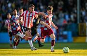 16 May 2025; Conor Kane of Drogheda United in action against Gavin Whyte of Derry City during the SSE Airtricity Men's Premier Division match between Drogheda United and Derry City at Sullivan & Lambe Park in Drogheda, Louth. Photo by Ramsey Cardy/Sportsfile