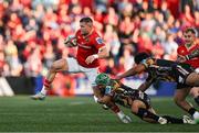 16 May 2025; Diarmuid Kilgallen of Munster is tackled by Tommaso Menoncello of Benetton Treviso during the United Rugby Championship match between Munster and Benetton at Virgin Media Park in Cork. Photo by Brendan Moran/Sportsfile