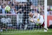 16 May 2025; Shelbourne goalkeeper Conor Kearns concedes a goal, scored by Dayle Rooney of Bohemians from a penalty, during the SSE Airtricity Men's Premier Division match between Bohemians and Shelbourne at Dalymount Park in Dublin. Photo by Seb Daly/Sportsfile