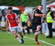 16 May 2025; Sean Murray of Cork City in action against Barry Baggley of St Patrick's Athletic during the SSE Airtricity Men's Premier Division match between St Patrick's Athletic and Cork City at Richmond Park in Dublin. Photo by Sam Barnes/Sportsfile
