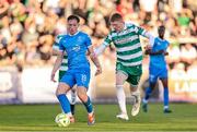 16 May 2025; Sam Glenfield of Waterford in action against Darragh Nugent of Shamrock Rovers during the SSE Airtricity Men's Premier Division match between Waterford and Shamrock Rovers at the Regional Sports Centre in Waterford. Photo by Thomas Flinkow/Sportsfile