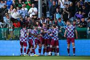 16 May 2025; Elicha Ahui of Drogheda United, centre, celebrates with team-mates after scoring their side's first goal during the SSE Airtricity Men's Premier Division match between Drogheda United and Derry City at Sullivan & Lambe Park in Drogheda, Louth. Photo by Ramsey Cardy/Sportsfile