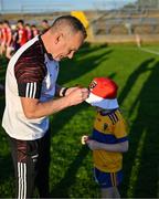 16 May 2025; Louth manager Fergal Reel signs an autograph for a supporter after the Dalata Hotel Group GAA Football All-Ireland U20 Championship semi-final match between Mayo and Louth at Glennon Brothers Pearse Park in Longford. Photo by Stephen Marken/Sportsfile