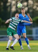 16 May 2025; Rory Gaffney of Shamrock Rovers pulls the jersey of Kacper Radkowski of Waterford during the SSE Airtricity Men's Premier Division match between Waterford and Shamrock Rovers at the Regional Sports Centre in Waterford. Photo by Thomas Flinkow/Sportsfile