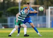 16 May 2025; Rory Gaffney of Shamrock Rovers in action against Kacper Radkowski of Waterford during the SSE Airtricity Men's Premier Division match between Waterford and Shamrock Rovers at the Regional Sports Centre in Waterford. Photo by Thomas Flinkow/Sportsfile