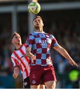 16 May 2025; Conor Keeley of Drogheda United in action against Gavin Whyte of Derry City during the SSE Airtricity Men's Premier Division match between Drogheda United and Derry City at Sullivan & Lambe Park in Drogheda, Louth. Photo by Ramsey Cardy/Sportsfile