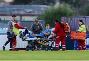 16 May 2025; Kacper Radkowski of Waterford is taken off the pitch injured during the SSE Airtricity Men's Premier Division match between Waterford and Shamrock Rovers at the Regional Sports Centre in Waterford. Photo by Thomas Flinkow/Sportsfile