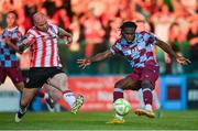 16 May 2025; Thomas Oluwa of Drogheda United shoots under pressure from Mark Connolly of Derry City during the SSE Airtricity Men's Premier Division match between Drogheda United and Derry City at Sullivan & Lambe Park in Drogheda, Louth. Photo by Ramsey Cardy/Sportsfile