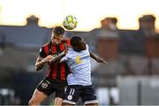 16 May 2025; Rob Cornwall of Bohemians in action against Mipo Odubeko of Shelbourne during the SSE Airtricity Men's Premier Division match between Bohemians and Shelbourne at Dalymount Park in Dublin. Photo by Seb Daly/Sportsfile
