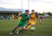16 May 2025; Sean McGrath of Kerry in action against Kaylem Harnett of Wexford during the SSE Airtricity Men's First Division match between Kerry and Wexford at Mounthawk Park in Tralee, Kerry. Photo by Michael P Ryan/Sportsfile