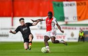 16 May 2025; Al-Amin Kazeem of St Patrick's Athletic in action against Cathal O'Sullivan of Cork City during the SSE Airtricity Men's Premier Division match between St Patrick's Athletic and Cork City at Richmond Park in Dublin. Photo by Sam Barnes/Sportsfile