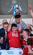 16 May 2025; Cork captain Bobby Carroll lifts The John Doyle Cup after his side's victory in the Electric Ireland GAA Hurling Munster Minor Championship final match between Cork and Waterford at FBD Semple Stadium in Thurles, Tipperary. Photo by Piaras Ó Mídheach/Sportsfile