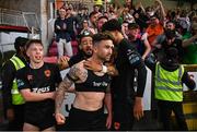 16 May 2025; Sean Maguire of Cork City, centre, celebrates with teammate and supporters after scoring his side's second goal, a penalty, during the SSE Airtricity Men's Premier Division match between St Patrick's Athletic and Cork City at Richmond Park in Dublin. Photo by Sam Barnes/Sportsfile