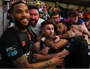 16 May 2025; Sean Maguire of Cork City, centre, celebrates with teammate and supporters after scoring his side's second goal, a penalty, during the SSE Airtricity Men's Premier Division match between St Patrick's Athletic and Cork City at Richmond Park in Dublin. Photo by Sam Barnes/Sportsfile