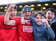 16 May 2025; Cork goalscorer Sam Ring of Cork, second from left, celebrates with supporters after victory in the Electric Ireland GAA Hurling Munster Minor Championship final match between Cork and Waterford at FBD Semple Stadium in Thurles, Tipperary. Photo by Piaras Ó Mídheach/Sportsfile