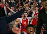 16 May 2025; St Patrick's Athletic supporters celebrate at  the final whistle following their side's victory in the SSE Airtricity Men's Premier Division match between St Patrick's Athletic and Cork City at Richmond Park in Dublin. Photo by Sam Barnes/Sportsfile