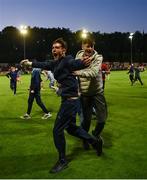 16 May 2025; St Patrick's Athletic supporters celebrate on the pitch after Jamie Lennon of St Patrick's Athletic scored his side's third goal during the SSE Airtricity Men's Premier Division match between St Patrick's Athletic and Cork City at Richmond Park in Dublin. Photo by Sam Barnes/Sportsfile