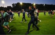 16 May 2025; St Patrick's Athletic supporters celebrate on the pitch after Jamie Lennon of St Patrick's Athletic scored his side's third goal during the SSE Airtricity Men's Premier Division match between St Patrick's Athletic and Cork City at Richmond Park in Dublin. Photo by Sam Barnes/Sportsfile