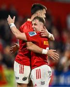 16 May 2025; Conor Murray, left, and Craig Casey of Munster celebrate at the final whistle of the United Rugby Championship match between Munster and Benetton at Virgin Media Park in Cork. Photo by Brendan Moran/Sportsfile