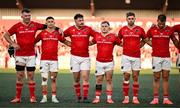 16 May 2025; Munster players, from left, Peter O'Mahony, Thaakir Abrahams, John Hodnett, Craig Casey, Jack Crowley and Alex Nankivell stand for a minute's silence in memory of the Great Famine before the United Rugby Championship match between Munster and Benetton at Virgin Media Park in Cork. Photo by Brendan Moran/Sportsfile