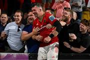 16 May 2025; Peter O'Mahony of Munster is congratulated by friends after the United Rugby Championship match between Munster and Benetton at Virgin Media Park in Cork. Photo by Brendan Moran/Sportsfile