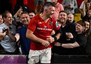 16 May 2025; Peter O'Mahony of Munster is congratulated by friends after the United Rugby Championship match between Munster and Benetton at Virgin Media Park in Cork. Photo by Brendan Moran/Sportsfile