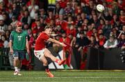16 May 2025; Craig Casey of Munster kicks a conversion during the United Rugby Championship match between Munster and Benetton at Virgin Media Park in Cork. Photo by Brendan Moran/Sportsfile
