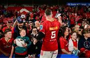 16 May 2025; Peter O'Mahony of Munster signs autographs after the United Rugby Championship match between Munster and Benetton at Virgin Media Park in Cork. Photo by Brendan Moran/Sportsfile