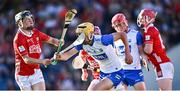 16 May 2025; Hugo Quann of Waterford in action against Seán Coughlan of Cork during the Electric Ireland GAA Hurling Munster Minor Championship final match between Cork and Waterford at FBD Semple Stadium in Thurles, Tipperary. Photo by Piaras Ó Mídheach/Sportsfile