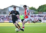 16 May 2025; Kian Leavy of St Patrick's Athletic in action against Harry Nevin of Cork City during the SSE Airtricity Men's Premier Division match between St Patrick's Athletic and Cork City at Richmond Park in Dublin. Photo by Sam Barnes/Sportsfile
