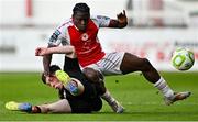16 May 2025; Al-Amin Kazeem of St Patrick's Athletic is tackled by Cathal O'Sullivan of Cork City during the SSE Airtricity Men's Premier Division match between St Patrick's Athletic and Cork City at Richmond Park in Dublin. Photo by Sam Barnes/Sportsfile