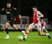 16 May 2025; Simon Power of St Patrick's Athletic in action against Freddie Anderson of Cork City during the SSE Airtricity Men's Premier Division match between St Patrick's Athletic and Cork City at Richmond Park in Dublin. Photo by Sam Barnes/Sportsfile