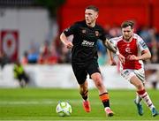 16 May 2025; Sean Murray of Cork City in action against Barry Baggley of St Patrick's Athletic during the SSE Airtricity Men's Premier Division match between St Patrick's Athletic and Cork City at Richmond Park in Dublin. Photo by Sam Barnes/Sportsfile