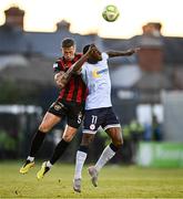 16 May 2025; Rob Cornwall of Bohemians in action against Mipo Odubeko of Shelbourne during the SSE Airtricity Men's Premier Division match between Bohemians and Shelbourne at Dalymount Park in Dublin. Photo by Seb Daly/Sportsfile
