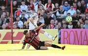16 May 2025; Shelbourne goalkeeper Conor Kearns closed down by Dayle Rooney of Bohemians during the SSE Airtricity Men's Premier Division match between Bohemians and Shelbourne at Dalymount Park in Dublin. Photo by Seb Daly/Sportsfile