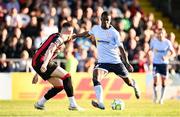 16 May 2025; Mipo Odubeko of Shelbourne in action against Sean Grehan of Bohemians during the SSE Airtricity Men's Premier Division match between Bohemians and Shelbourne at Dalymount Park in Dublin. Photo by Seb Daly/Sportsfile