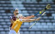 17 May 2025; Anthony Burns of Galway in action against Paddy Burke of Antrim during the Leinster GAA Hurling Senior Championship Round 4 match between Galway and Antrim at Pearse Stadium in Galway. Photo by Piaras Ó Mídheach/Sportsfile