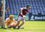 17 May 2025; Niall O’Connor of Antrim holds the leg of Brian Concannon of Galway during the Leinster GAA Hurling Senior Championship Round 4 match between Galway and Antrim at Pearse Stadium in Galway. Photo by Piaras Ó Mídheach/Sportsfile