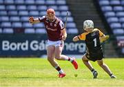 17 May 2025; Conor Whelan of Galway in action against Antrim goalkeeper Ryan Elliott during the Leinster GAA Hurling Senior Championship Round 4 match between Galway and Antrim at Pearse Stadium in Galway. Photo by Piaras Ó Mídheach/Sportsfile